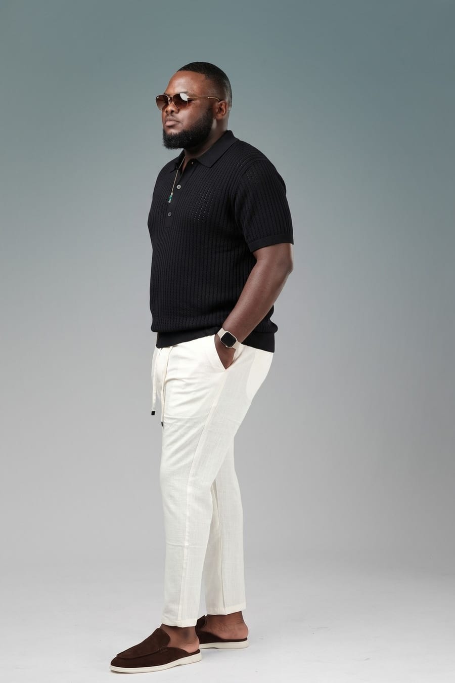 Black textured knit polo and cocoa Dune Mule, fitted